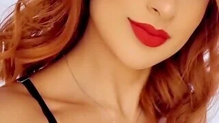 Close wide video of a beautiful chick smiling and having fun